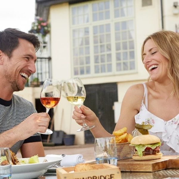 Couple Al Fresco Dining on Terrace