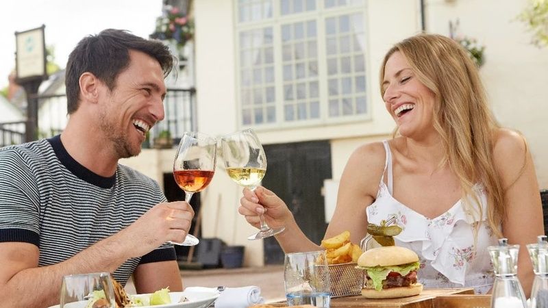 Couple Al Fresco Dining on Terrace